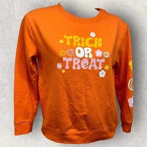 Trick or treat Halloween orange Girl’s sweater size L (10-12)